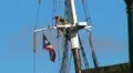 25p Brave Girl on Sailboat Mast HD Footage