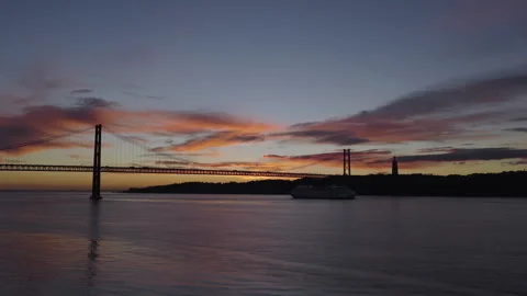The 25th of April Bridge in Lisbon at sunset Video stock 327672864