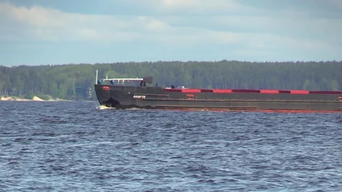 26. The barge floats on the river Stock Footage 133434713