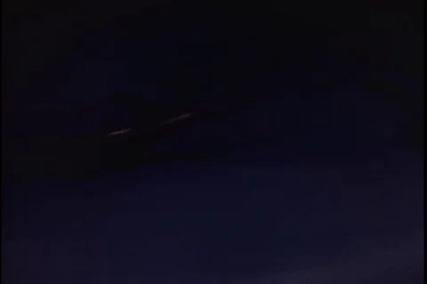 A-26 formation in flight above clouds and dropping bombs - 1945 Stock Footage 104649653