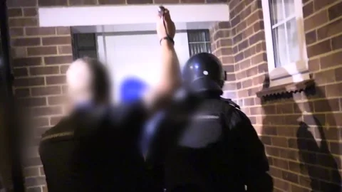 26 held in raids across UK and Europe in people smuggling crackdown Stock Footage 148647694