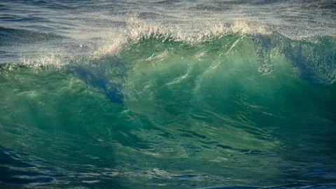 260324 3708 A wave with strange patterns from backlighting. Stock Photos