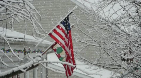 2623 American Flag with Snowflakes Falling in Slow Motion Stock Footage 44408142