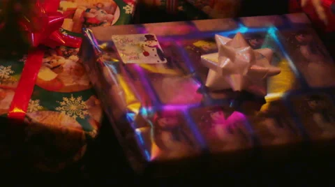 2694 Presents with Red Bow Under the Christmas Tree, 4K Stock Footage 44906676