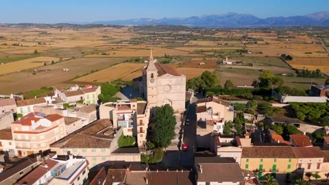 Circling Drone Shot of Church and Town at Sunrise, Santa Margalida, Mallorca Circling Drone Shot of Church and Town at Sunrise, Santa Margalida, Mallorca