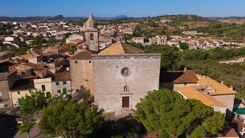 Up and over shot of church facade in Maria de la Salut, Mallorca - Aerial Drone Up and over shot of church facade in Maria de la Salut, Mallorca - Aerial Drone