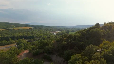 Valley with Tree Covered Mountains in Greek Macedonia - Aerial Drone