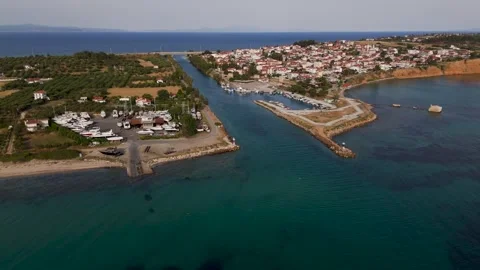 Harbor and Canal at Nea Poteidaia, Kassandra, Halkidiki, Greece, Aerial Drone Harbor and Canal at Nea Poteidaia, Kassandra, Halkidiki, Greece, Aerial Drone
