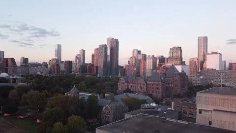 2.7K Aerial moving over U of T campus looking at Toronto skyline at sunset Stock Footage 147149801