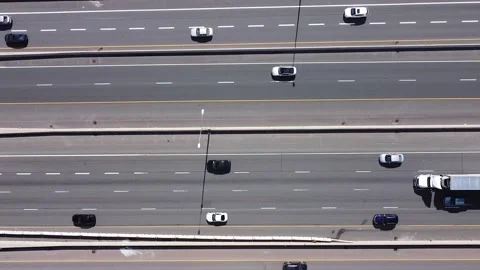 2.7K birds eye view aerial flight ascending straight up while looking at 16 lane Stock Footage 149995953