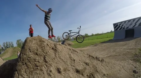 2.7k bmx riders bails out mid air great angle Stock Footage 50376555