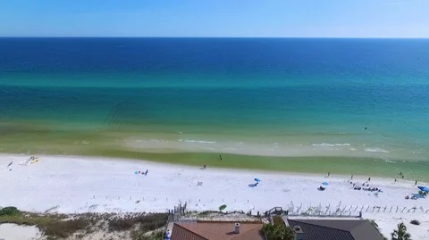 2.7K Drone Backing Up From Ocean Over Beach Homes Stock-Footage 109229696