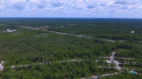 2.7K Drone Flying High Over Forest Roads Stock Footage 109373326