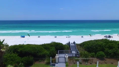 2.7K Drone Flying Over Beach Access Out To Colorful Ocean Water Stock Footage 109299689