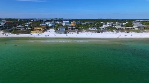 2.7K Drone Flying Over Emerald Green Ocean Water Towards Coastal Town Stock-Footage 109373215
