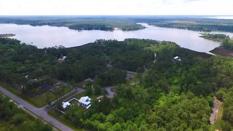 2.7K Drone Flying Over Forest and Lake Stock-Footage 109299797