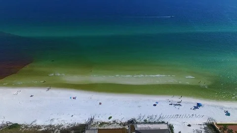 2.7K Drone Flying Over the Ocean With Lone Boat Driving By Stock-Footage 109229982
