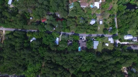 2.7K Drone Flying Top Down Over Wooded Neighborhood 库存影片 109356687