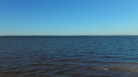 2.7K Drone Lifting Up From Low Over Body of Water Video stock 109299570
