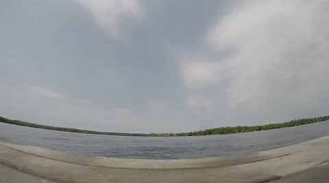 2.7k guy dives off dock Stock Footage 52431062