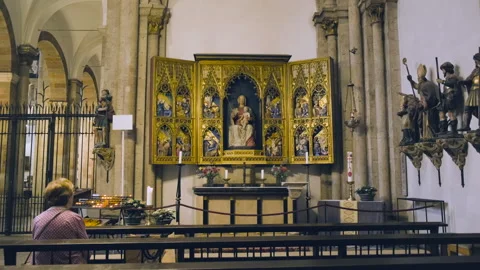 28 August 2025 Cologne, Germany. Unrecognizable Woman Praying in Church. Stock Footage 317626443