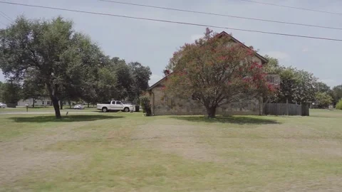 29-7-2026 Georgetown, Tx POV Drive Neighborhood With Large Lots and Shade Trees Stock Footage 340846777