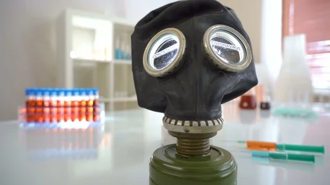 29143 The standing hazard mask with the coronavirus or Covid-19 on the glass  Stock Footage 129344591