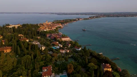 Narrow Peninsula at Sunset, Sirmione, Lake Garda, Italy - Aerial Drone Narrow Peninsula at Sunset, Sirmione, Lake Garda, Italy - Aerial Drone