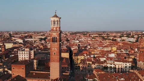 High approach to Torre dei Lamberti, Piazza Delle Erbe, Verona - Aerial Drone