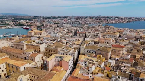 Wide & low flight over Isola Di Ortigia, Syracuse, Sicily, Italy - Aerial Drone Wide & low flight over Isola Di Ortigia, Syracuse, Sicily, Italy - Aerial Drone