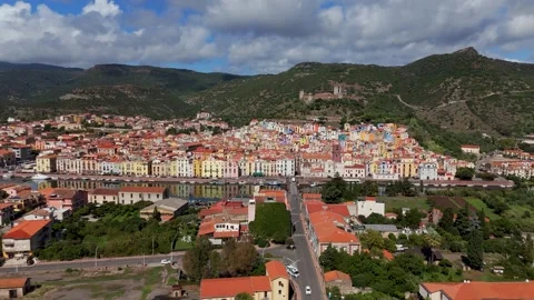 Crossing the bridge towards Bosa, Sardinia, Italy - Aerial Drone
