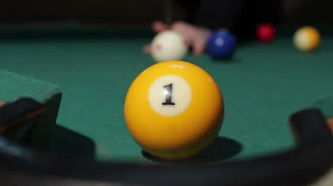 29/35 Man playing billiard. Player is taking a shot and put ball in the hole. Stock Footage 36431740