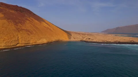 Towards the Yellow Mountain, La Graciosa, Canary Islands, Spain - Aerial Drone Towards the Yellow Mountain, La Graciosa, Canary Islands, Spain - Aerial Drone