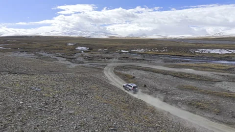 On 29th, October, aerial Drone View of SUV Off-Road Driving in Shannan, Tibet Video stock 340253984