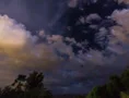 2K 24p Night clouds with subtle lightning flashes in time lapse Web Footage