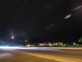 2K 24p Night traffic with lightning on horizon time lapse Web Footage