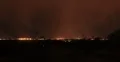 2K 30p - Night time curtain of rain over a city in time lapse Web Footage