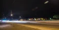 2K 30p Night traffic with lightning on horizon time lapse Web Footage
