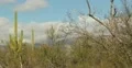 2K 30p pan l - Winter cloud formation over mountains in the desert in time lapse Web Footage