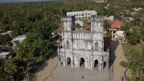 2K Aerial close-up view of the ancient catholic Mang Lang Church in Vietnam Stock-Footage 97865577