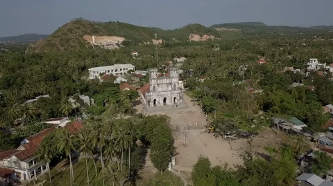 2K Aerial close-up view of the ancient catholic Mang Lang Church in Vietnam Stock Footage 97869404