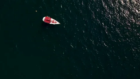 2k Aerial Drone Footage Flying around the yacht in the sea Stock Footage