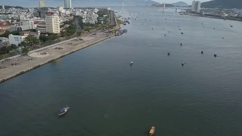 2K Aerial Drone top view over fishing boats near Dragon Bridge in Da Nang Stock Footage 97878878