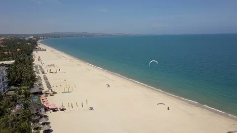2K Aerial Overhead View of two people practicing kitesurfing Stock Footage 97857524