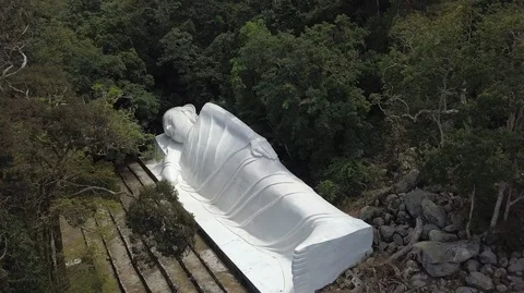 2K Aerial top view of big reclining Buddha monument in Ta Cu Mountain, Vietnam Stock Footage 97873534