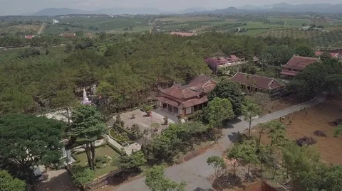 2K Aerial top view of an old asian temple in Bao Loc Vietnam Stock Footage 97860812
