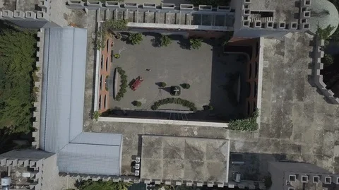 2K Aerial Top view of RD wine castle on green hill. Castle's square Stock Footage 97871060