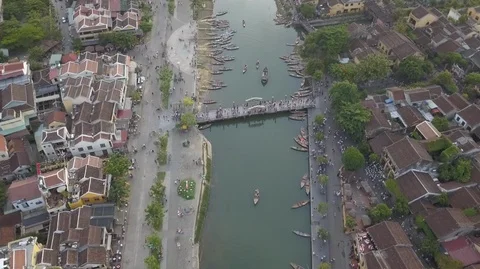 2K Aerial top view of the river and bridge with boats on water in Hoi An Stock Footage 97882345
