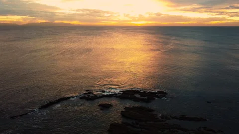 2K Ariel view of sunset over ocean Video stock 149283448