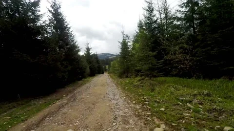 2K. Car driving through the countryside in the mountains. Stock Footage 67363630